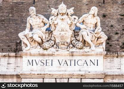 ROME, ITALY - CIRCA SEPTEMBER 2020: the famous Vatican Museum building. Detail of the sign above the main entrance.