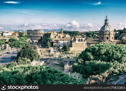 Rome, Italy city skyline with landmarks of the Ancient Rome ; Colosseum and Roman Forum, the famous travel destination of Italy.