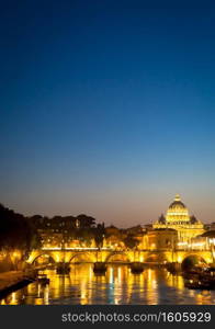 ROME, ITALY - JUNE 2020  sunset panorama on Tiber river bridge with Saint Peter Cathedral dome  Vatican City  in background - Rome, Italy