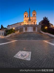 ROME, ITALY - NOVEMBER 1, 2013: Spanish Steps and Trinita del Monti Church in Rome. The monumental stairway of 135 steps was built with French diplomat Etienne Gueffier?s funds.