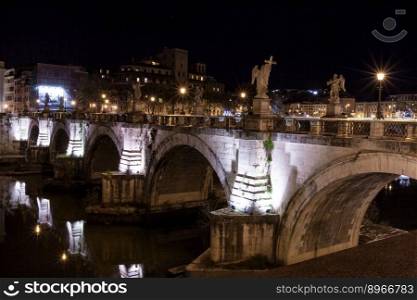 Rome, Italy, the bridge in the night city is beautifully illuminated