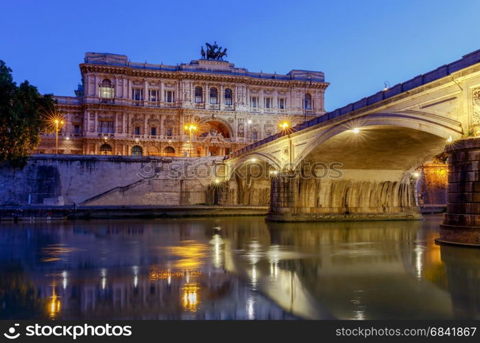 Rome. Palace of Justice and Umberto Bridge.. Night view of the Palace of Justice and the Umberto Bridge across the Tiber River. Rome. Italy.