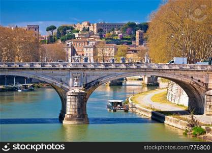 Rome riverfront and Tiber river bridges, eternal city and capital of Italy
