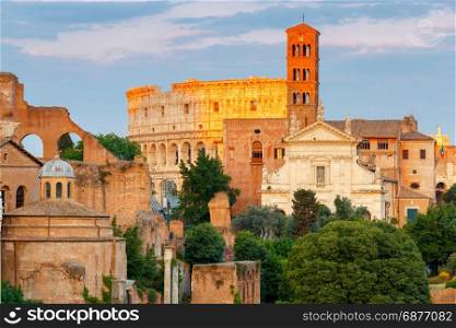 Rome. Roman Forum and Colosseum.. View of the Roman Forum and Colosseum in the golden hour. Rome. Italy.