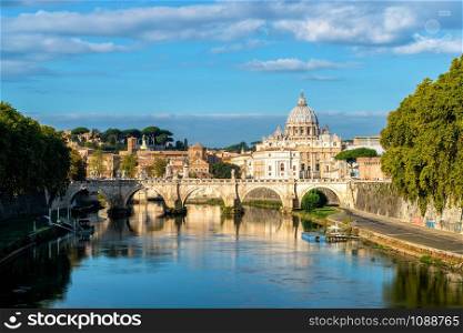 Rome Skyline with Vatican St Peter Basilica of Vatican and St Angelo Bridge crossing Tiber River in the city center of Rome Italy. It is historic landmark of the Ancient Rome and travel destination.