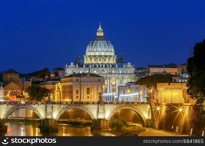 Rome. The Tiber River and Saint Peter&rsquo;s Cathedral.. Night view of the Tiber River and St. Peter&rsquo;s Cathedral in the Vatican. Italy.