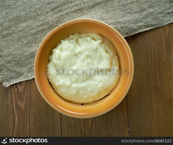 Rommegraut Norwegian porridge made with sour cream, whole milk, wheat flour, butter, and salt