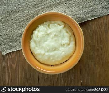 Rommegraut Norwegian porridge made with sour cream, whole milk, wheat flour, butter, and salt