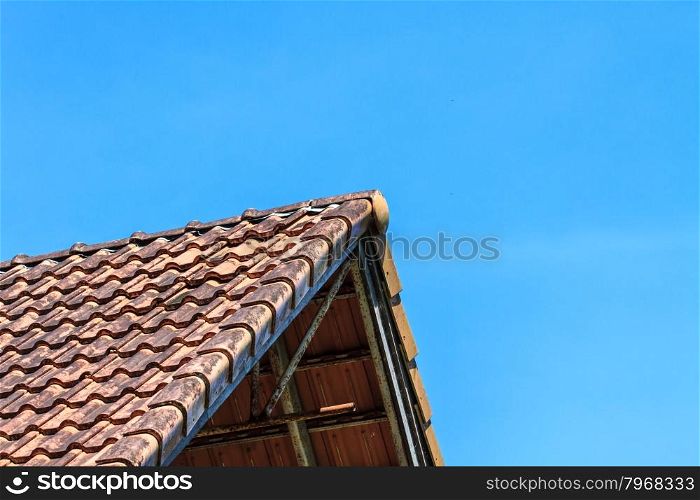 roof tile pattern over blue sky