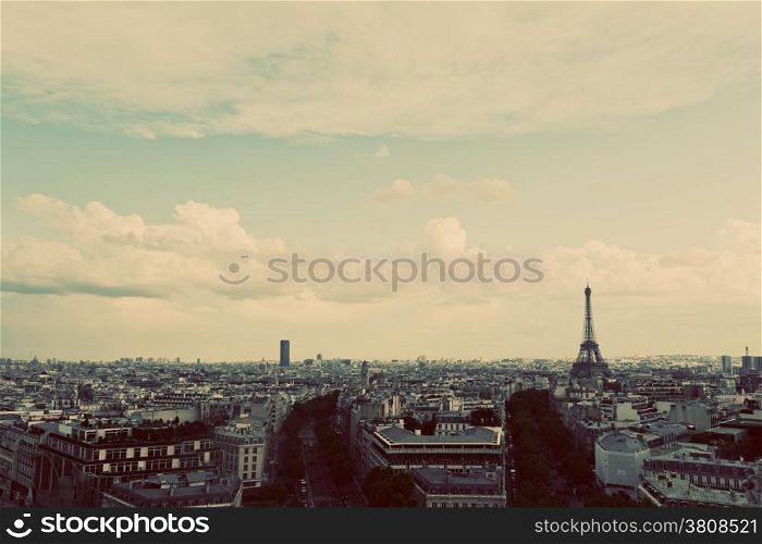Rooftop view on the Eiffel Tower from Arc de Triomphe. Sunny day, blue sky. Tour Eiffel. Vintage, retro style