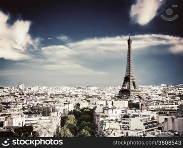 Rooftop view on the Eiffel Tower from Arc de Triomphe. Sunny day, blue sky. Tour Eiffel