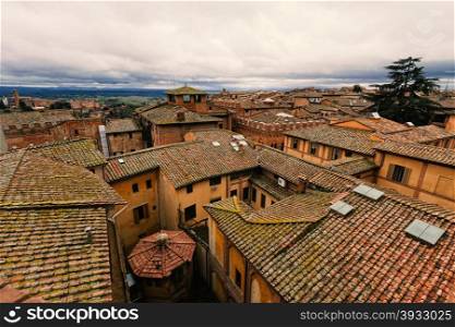 Rooftop views of medieval town of Siena, Italy.