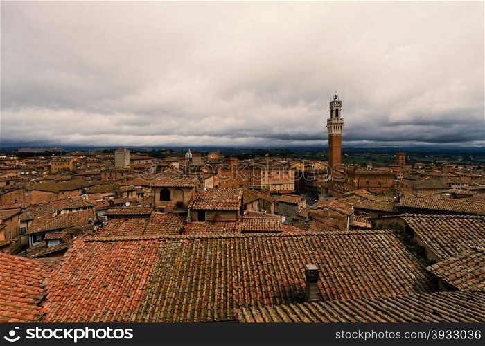 Rooftop views of medieval town of Siena, Italy.
