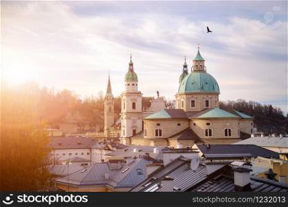 Rooftops of Salzburger Cathedral, Houses and Churches in the evening. Stunning atmosphere.