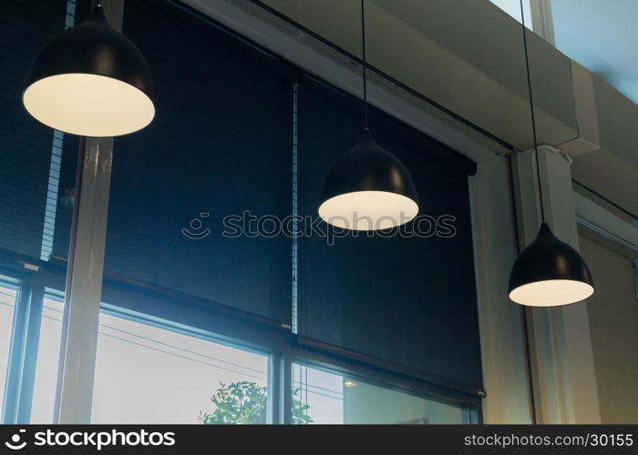 Room decorated retro hanging lamp , stock photo