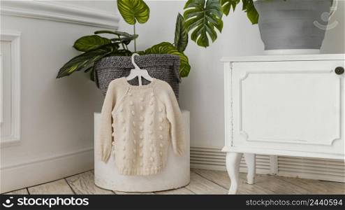room interior with knitted sweater
