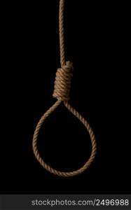 Rope noose with tight hangman knot isolated on black background