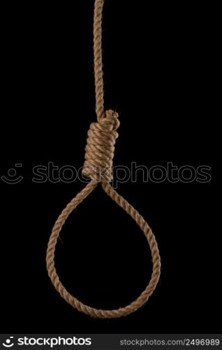 Rope noose with tight hangman knot isolated on black background