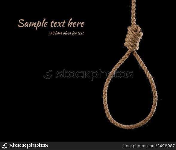 Rope noose with tight hangman knot isolated on black background with side copy space