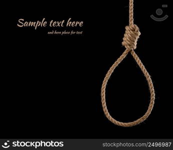 Rope noose with tight hangman knot isolated on black background with side copy space