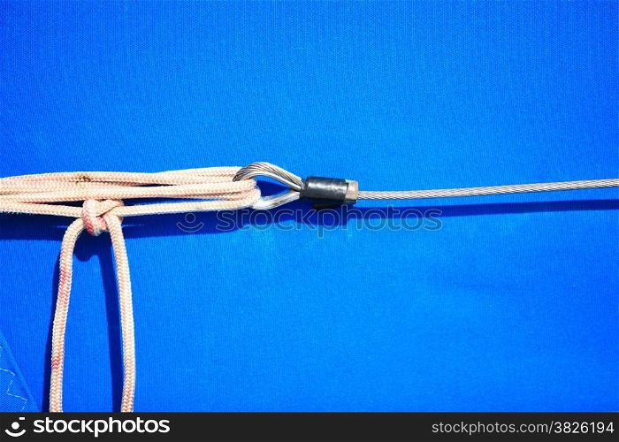 rope on sailing boat blue background. Yacht detail. Yachting