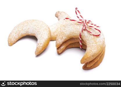 Rope tied pile of traditional Vanillekipferl vanilla kipferl cookies isolated on white background. High quality photo. Rope tied pile of traditional Vanillekipferl vanilla kipferl cookies isolated on white background
