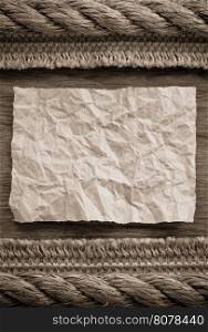 ropes and sack burlap on wooden background