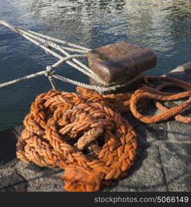 Ropes tied to a mooring bollard, Ischia Island, Campania, Italy