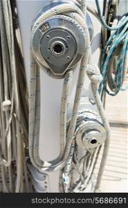 Ropes wound around winches on sailboat