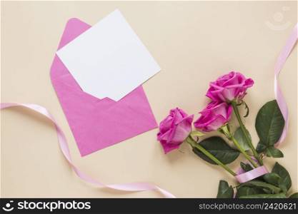 rose flowers with paper envelope