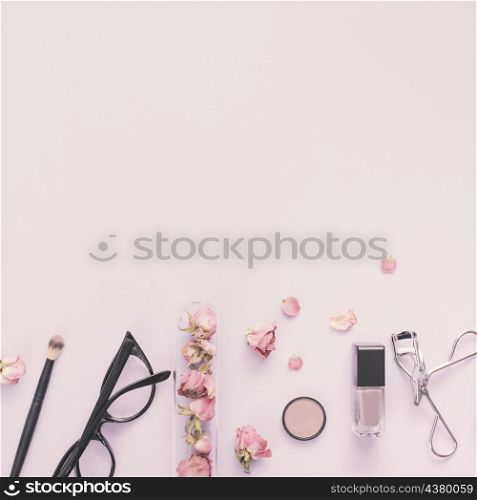 rose petals with cosmetics table
