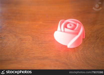 Rose shape of gelatin print on vintage background, stock photo