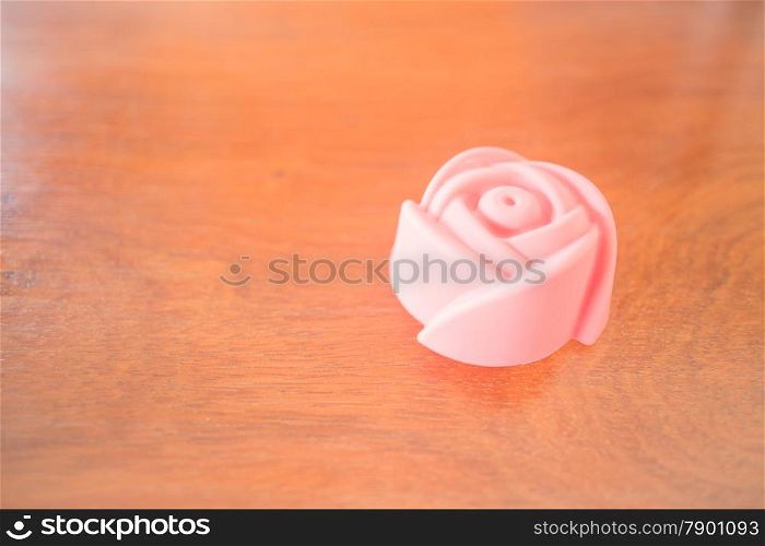 Rose shape of gelatin print on vintage background, stock photo