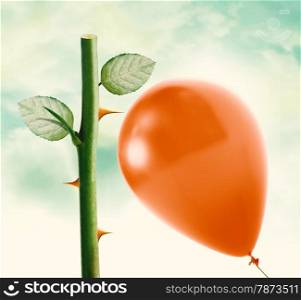 Rose thorn about to pop love heart balloon in vintage blue sky, clipping path and alpha channel included.