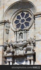 Rose window on Porto Cathedral facade, Roman Catholic church, Potugal. Construction around 1110.