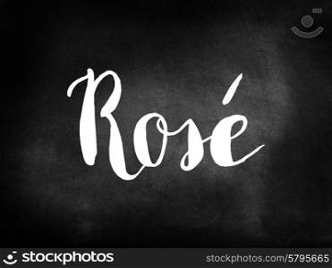 Rose written on a blackboard