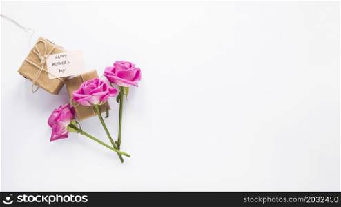 roses with gifts happy mothers day inscription