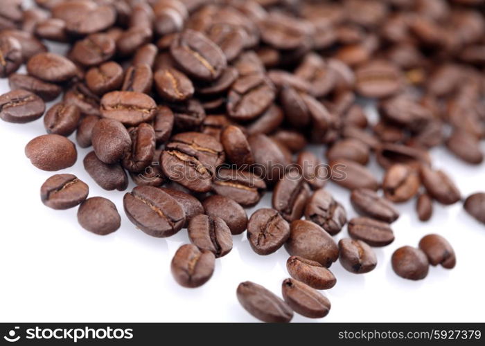 Rosted coffee grains on white backgorund