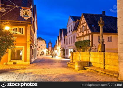 Rothenburg ob der Tauber. Hisoric tower gate and cobbled street of medieval German town of Rothenburg ob der Tauber. Bavaria region of Germany