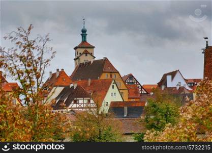Rothenburg on Tauber cityscape with house roofs, cloudy top view&#xA;