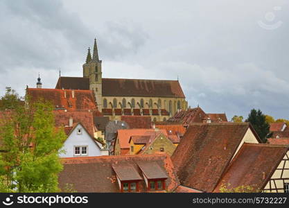 Rothenburg on Tauber cityscape with house roofs, cloudy top view&#xA;