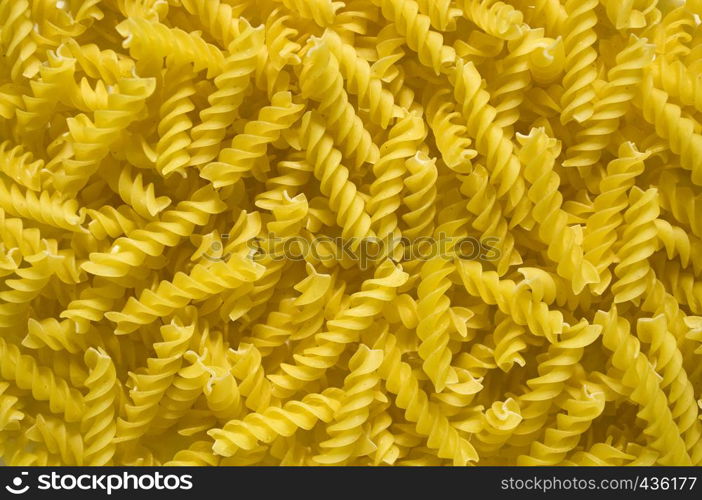 Rotini corkscrew shaped pasta background