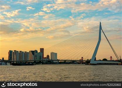 Rotterdam city cityscape with Erasmus bridge at sunset. South Holland, Netherlands.