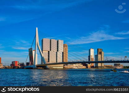 Rotterdam cityscape with Erasmus bridge over Nieuwe Maas river on sunset. Netherlands. Rotterdam cityscape ,  Netherlands