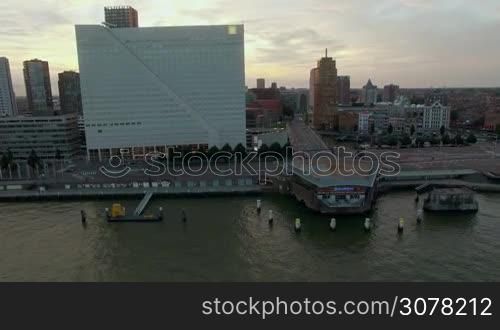 ROTTERDAM, NETHERLANDS - AUGUST 07, 2016: Aerial waterside view of the city with Willemswerf building, White House and Cube Houses. Traffic on the roads