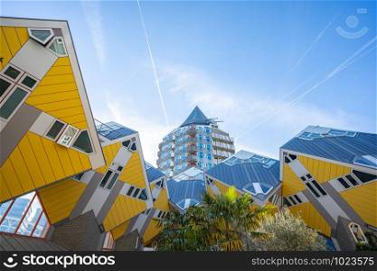 Rotterdam, Netherlands - May 13, 2019: Cube House with Rotterdam skyline in Rotterdam, Netherlands