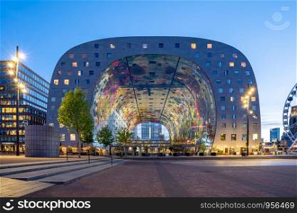 Rotterdam, Netherlands - May 13, 2019: View of Markthal at night in Rotterdam city, Netherlands.