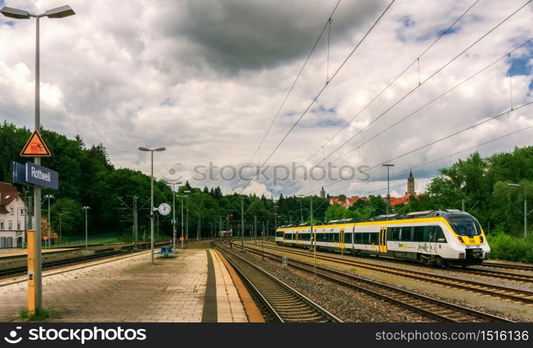 ROTTWEIL,GERMANY - JUNE 20,2020:Train station This is the view from the platform to a modern train from Deutsche Bahn, which runs from Rottweil to Stuttgart.