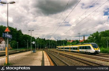 ROTTWEIL,GERMANY - JUNE 20,2020:Train station This is the view from the platform to a modern train from Deutsche Bahn, which runs from Rottweil to Stuttgart.