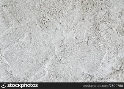 Rough and raw concrete or cement wall texture background .
